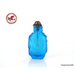 Antique Chinese Snuff Bottle Carved in blue Glass with Elephant,  base in the shape of elephant legs