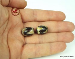 Two ancient,  very powerful and small Tibetan Dzi beads made of "Tiger Tooth" agate with very high energy