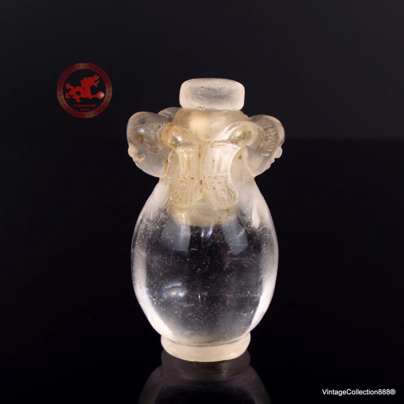 Antique Chinese Rock Crystal Snuff Bottle carved with 2 girls' heads with pigtails from the 19th Century