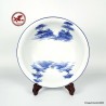 Vintage Japanese ceramic deep plate of 9.25" with hand painted blue and white tree landscape