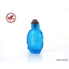 Antique Chinese Snuff Bottle Carved in blue Glass with Elephant,  base in the shape of elephant legs